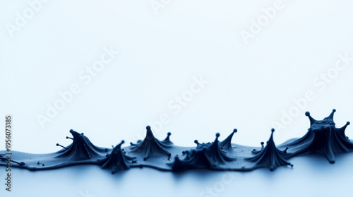 Deep blue liquid splashes with symmetrical sharp crown shapes on a light blue background, thick texture, soft lighting,