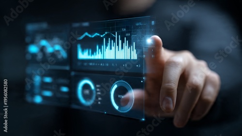 Hand interacting with futuristic digital interface displaying data analytics