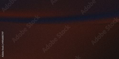 Close-up view of a dark, textured surface with subtle horizontal gradient lines