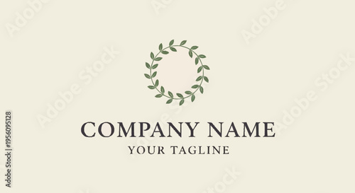 A logo design with a leafy wreath.