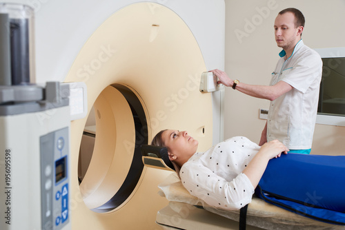 Billede på lærred Female patient undergoing MRI - Magnetic resonance imaging in Hospital