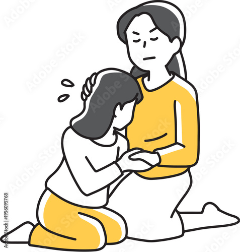 泣く女の子を慰める女性