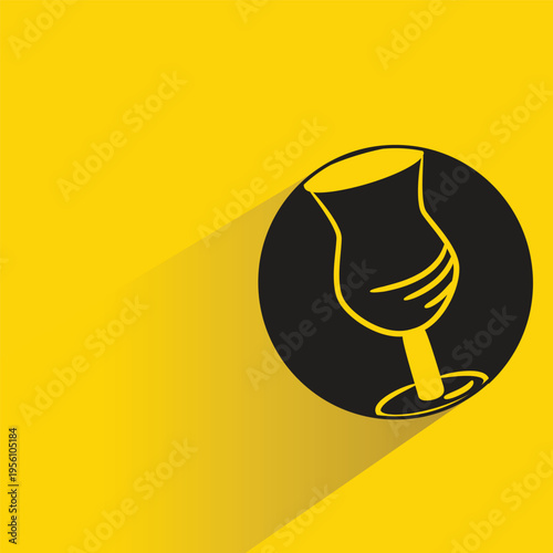 wine glass icon with shadow on yellow background