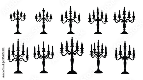 Collection of black iron candelabras with multiple candlesticks