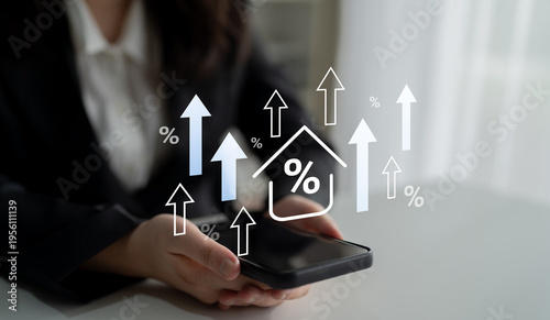 Quadro su tela A professional business person holds a smartphone displaying growth icons