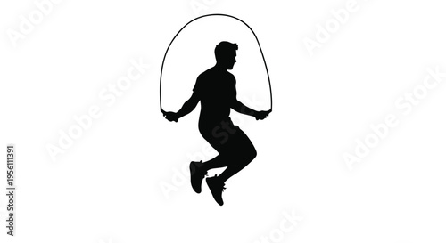 Silhouette of fit young adult jumping rope exercising outdoors in energetic motion with jump rope