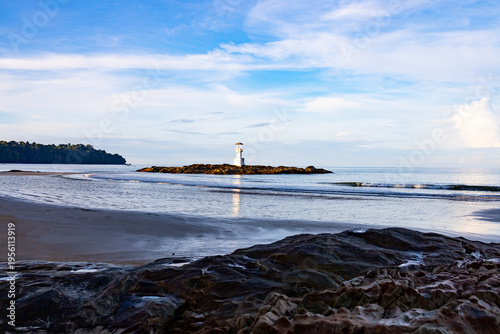 Khao Lak Lighthouse, Phang Nga, Thailand, with a blue sky