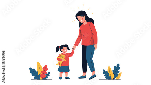 Loving mother holding hands with her young daughter as they walk together outside in a park or garden environment.