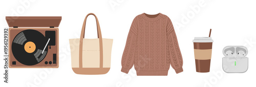 Curated selection of modern lifestyle objects, including a record player and knit sweater, represents a relaxed and cozy aesthetic.