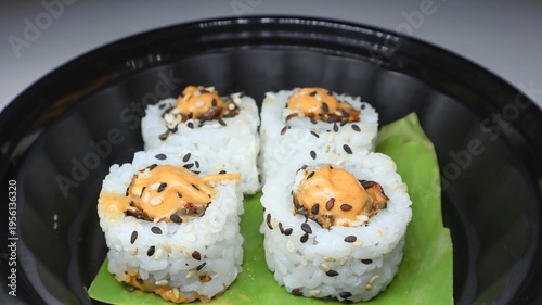 Photography Closeup of shot of mouth-watering sushi roll filled with variety of ingredients