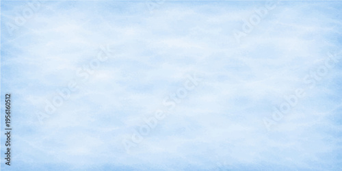 Gentle clouds drifts peacefully across a bright sky, offering a sense of calm and openness.