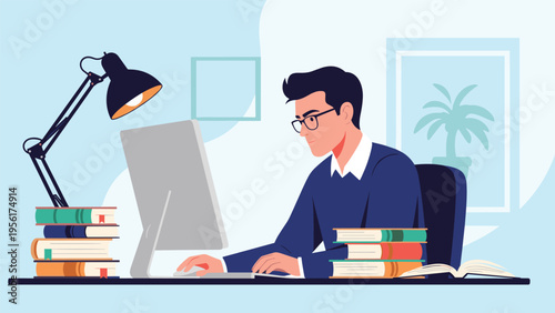 Focused male student or remote worker in blue sweater types on a computer at a desk cluttered with stacks of books.