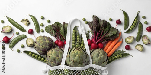 Fresh assorted vegetables in a mesh bag for a healthy lifestyle choice illustration
