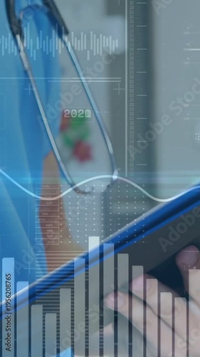 Vertical video: Dr tapping blue tablet pen poised HUD charts moving while noting vitals stethoscope