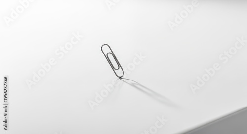 Close up of a small, insignificant object slightly askew on a clean desk, symbolizing a deeply annoying, persistent feeling of disruption, abstract, subtle, overwhelming