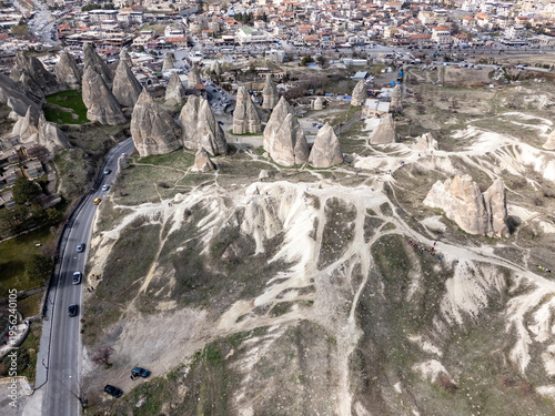 Cappadocia valley landscape with fairy chimney rock formations and Goreme village
