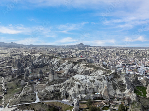 Cappadocia valley landscape with fairy chimney rock formations and Goreme village