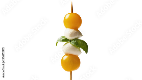 Quadro em tela Isolated fresh Caprese skewer featuring yellow tomatoes, creamy mozzarella, and
