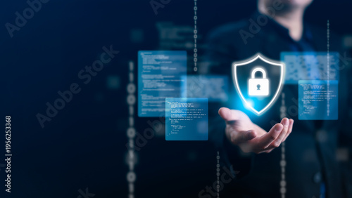 Professional programmer displaying glowing shield padlock icon with source code and binary data, representing secure software development, cybersecurity system, and encryption technology concept.