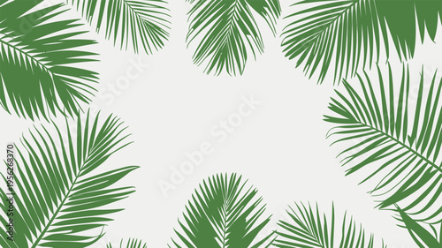 Green palm leaves create a tropical frame around an empty space for design or text use in a sunny setting