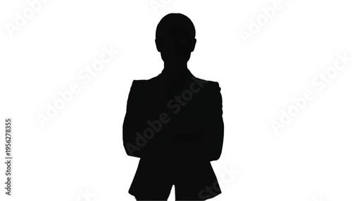 Female executive silhouette stands with arms folded demonstrating professional focus against a plain.