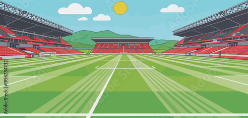 Sunny day at a sports stadium with green grass field and empty stands ready for a game in the afternoon