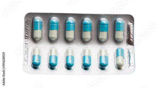 Isolated pharmaceutical blister pack with twelve turquoise and cream capsules for healthcare.