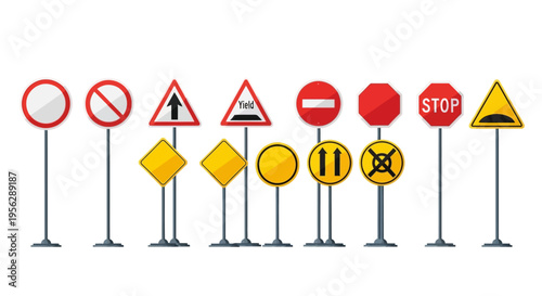 A collection of various road signs on metal poles in a row on the roadside