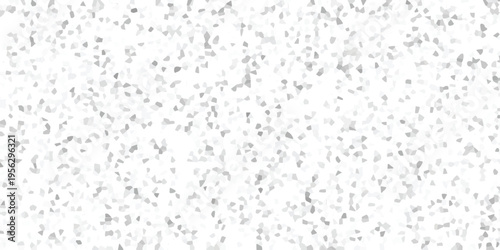 Subtle abstract texture featuring a dense, random distribution of small, irregular gray polygonal shapes on a bright white background for design