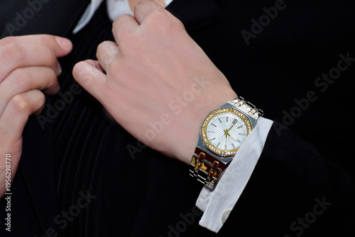 Luxury watches placed on a glittering glass floor