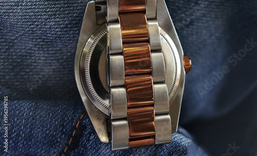 Luxury watches placed on a glittering glass floor