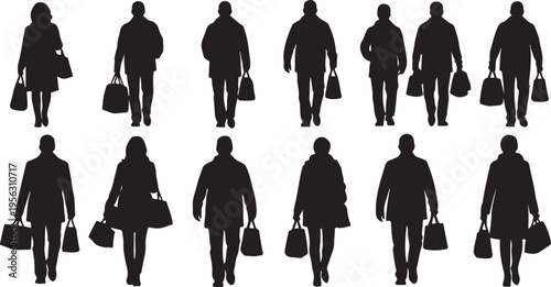 Silhouettes of people walking with shopping bags downtown
