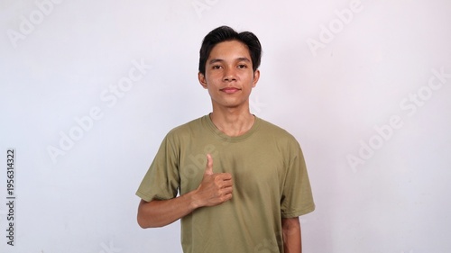 Asian young man smiling okay gesture