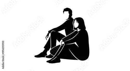 Silhouette of a couple sitting together in contemplation and companionship.