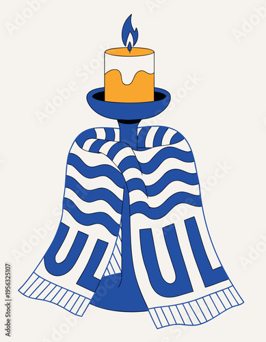 A candle is placed on a round holder. The candle has a yellow top and white base. A blue and white towel with wavy patterns is draped around the holder.