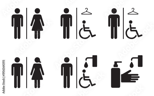 Detailed facility signage including gendered toilets and accessible compartments with hand sanitizer stations