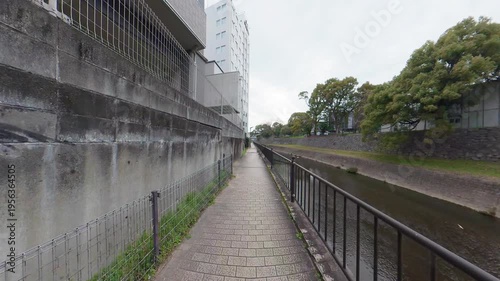 Walking Along a Narrow Paved Path by the River, Peaceful Riverside Scenery in Japan