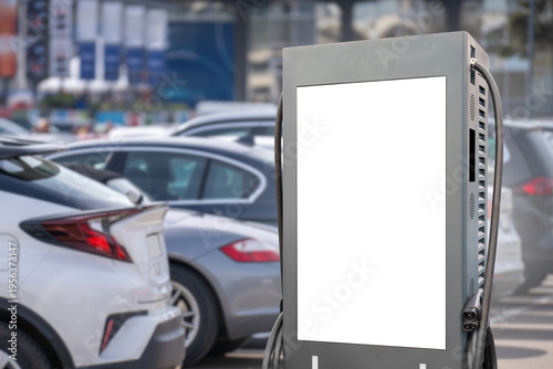 Wallpaper Mural Electric vehicle charging station with large digital advertising screen Torontodigital.ca