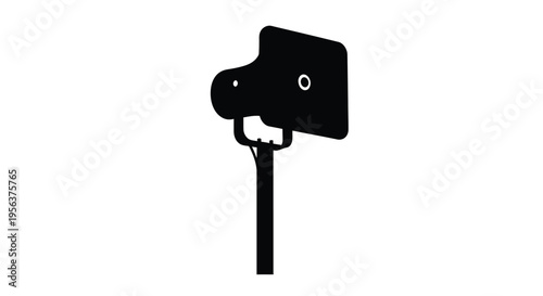 A black silhouette of a speed camera mounted on a pole