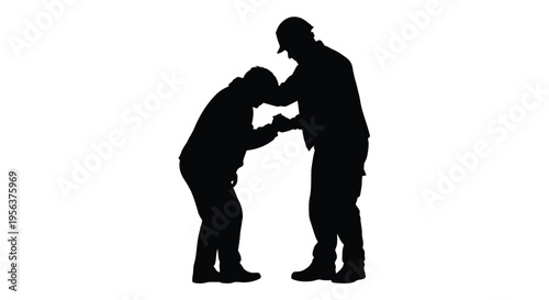 Silhouette of two people engaged in a playful wrestling match