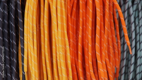 Fotografía Reflective safety shoelaces in vibrant orange and yellow for night running and o