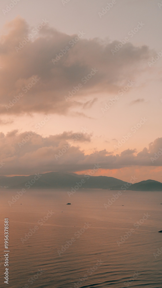 Fototapeta premium Minimalist Zen Meditation Background with Calm Ocean and Sunset Clouds