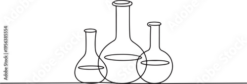 Three Laboratory Flasks With Liquid On White Background