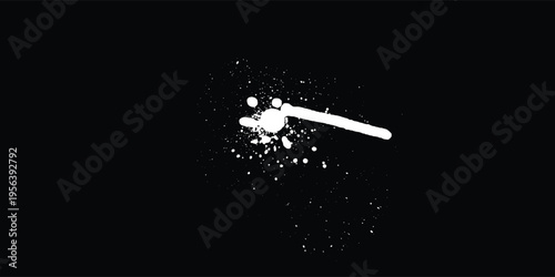 White color spray paint or graffiti design element on the black wall background.