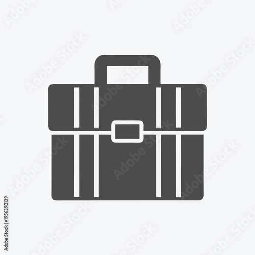 Simple gray briefcase shows symbolic business object on a plain background now