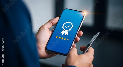 A person holding a smartphone with a verification badge on the screen