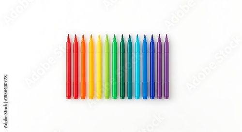 A set of colorful pencils arranged in a rainbow pattern on white