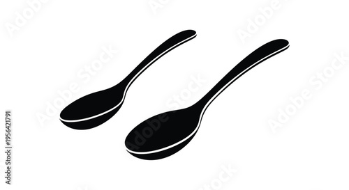 Two black spoons are displayed on a stark white background