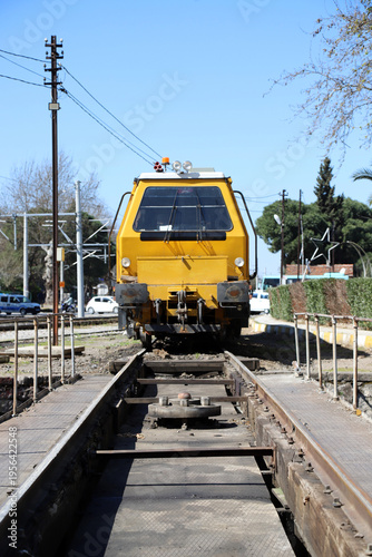 Yellow Ballast Tamper for Railway Maintenance, Industrial Railway Maintenance Equipment Close-Up