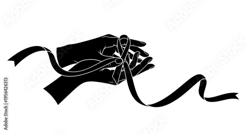 Hand holding ribbon with bow knot.